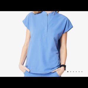 FIGS WOMANS CELL BLUE MEDIUM IN GREAT CONDITION.